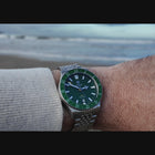 RÁTH Droma GMT watch on wrist at the beach inspired by the Atlantic